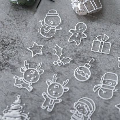 White outline Christmas nail stickers with reindeer, snowman and gift – minimalist holiday nail art
