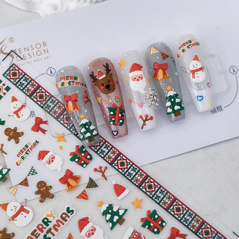 Christmas nail stickers with Santa Claus, reindeer and gift designs applied on nails – festive holiday nail art
