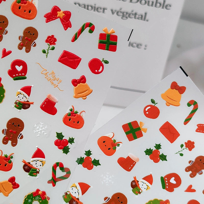 Christmas nail sticker sheets with Santa Claus, candy cane, gift and wreath designs
