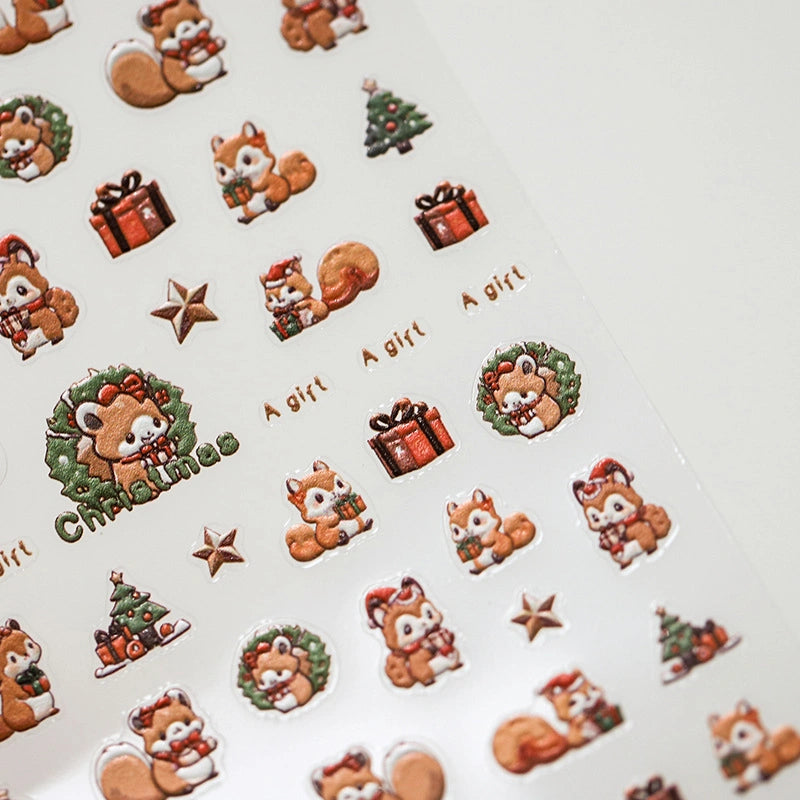 Cute Christmas squirrel nail stickers with presents and holiday wreath designs