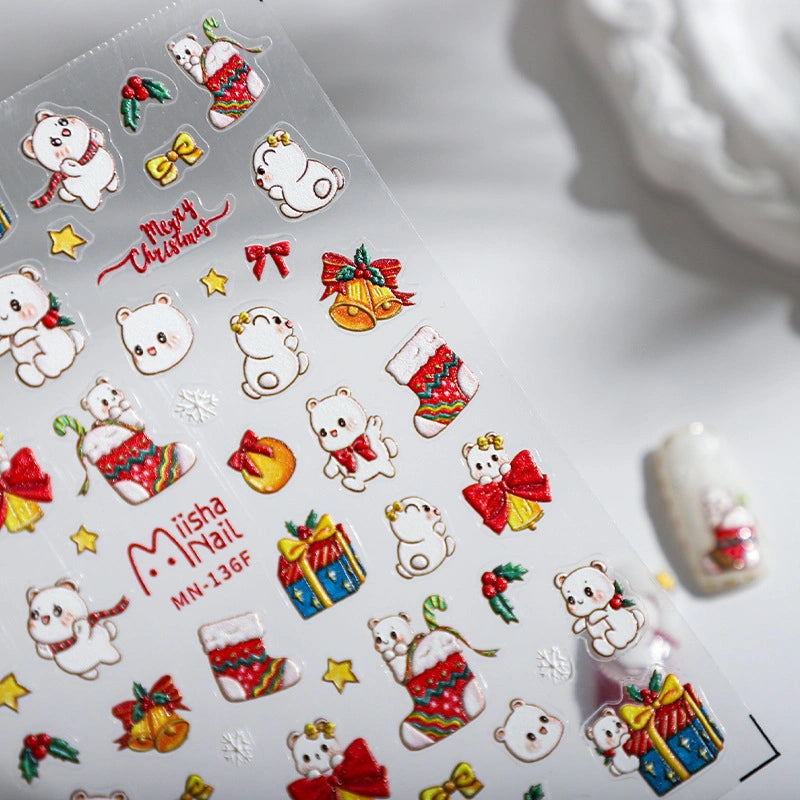 White bear Christmas nail stickers with stockings, bows and holly berry decorations