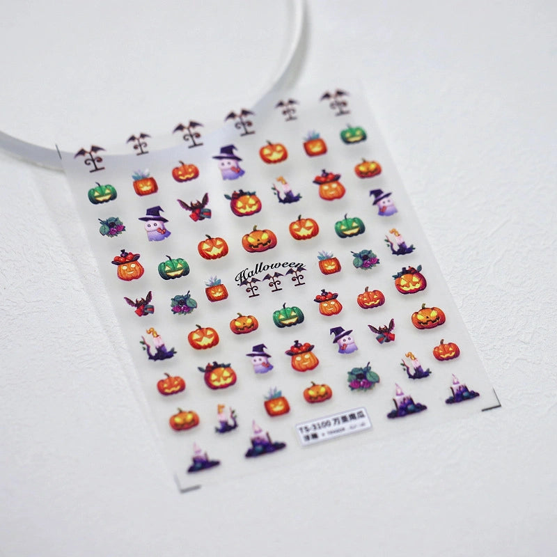 Halloween-themed 3D nail stickers with pumpkins and ghosts – perfect for October nail art.