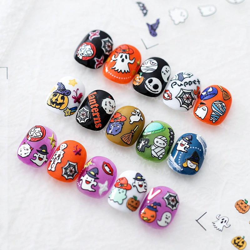 Halloween nail stickers with ghosts, pumpkins, skulls and witch hats – cute cartoon nail art decals