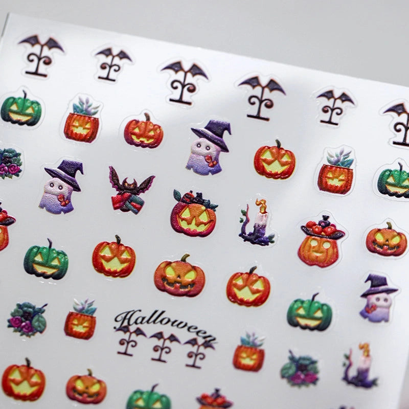 Pumpkin and ghost Halloween nail decals.