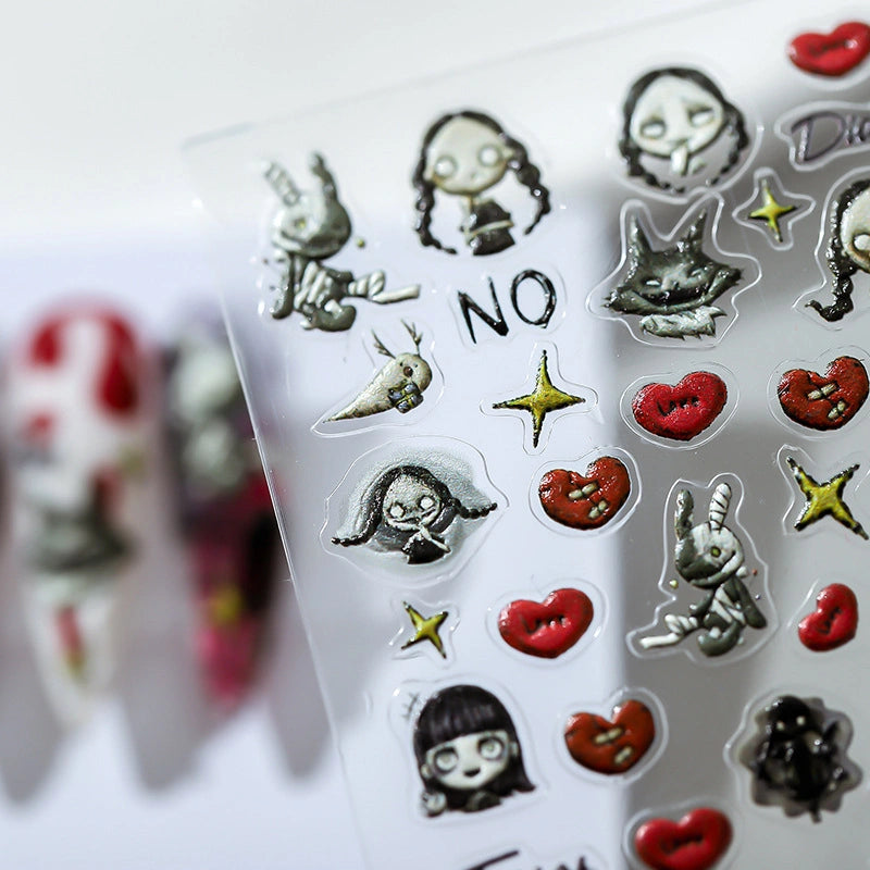 dark gothic nail art stickers, showing a pigtailed girl, a skull rabbit, red hearts, golden stars, and the word "NO", with a niche dark style